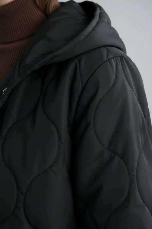 Caurelle | Women’s Black Long Quilted Puffer Coat – Refined Warmth in Classic Form